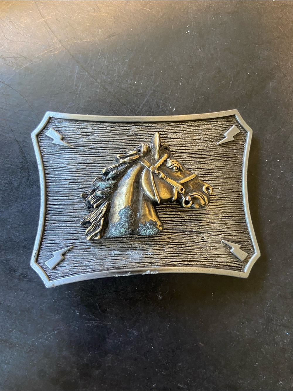 Vintage Silvertone belt buckle with Brass horse relief. natural patina.